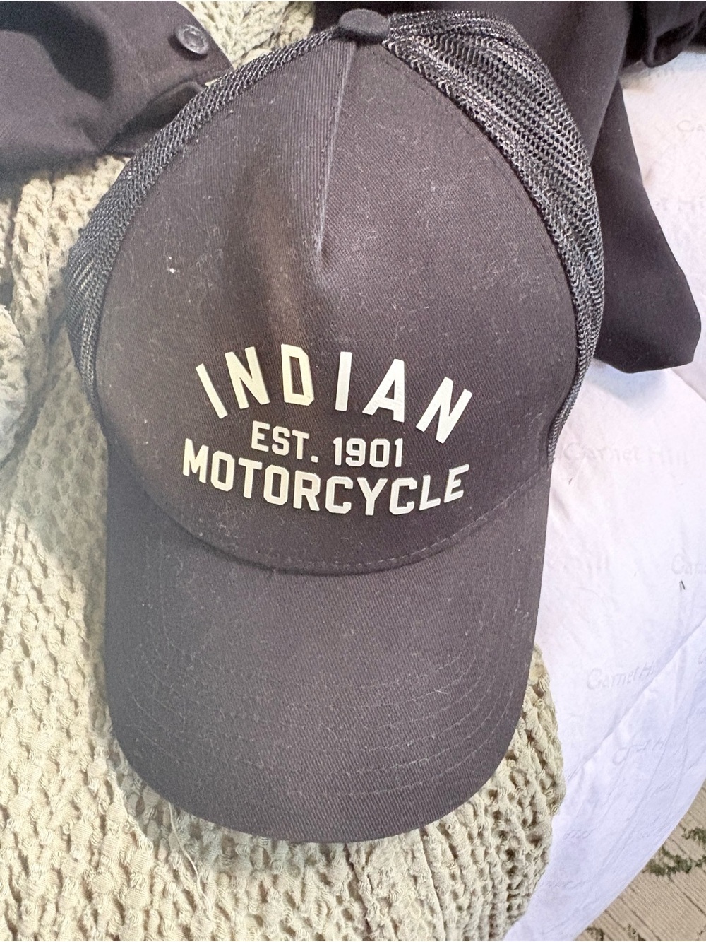 Indian Motorcycle Black Trucker Hat with Cream Logo